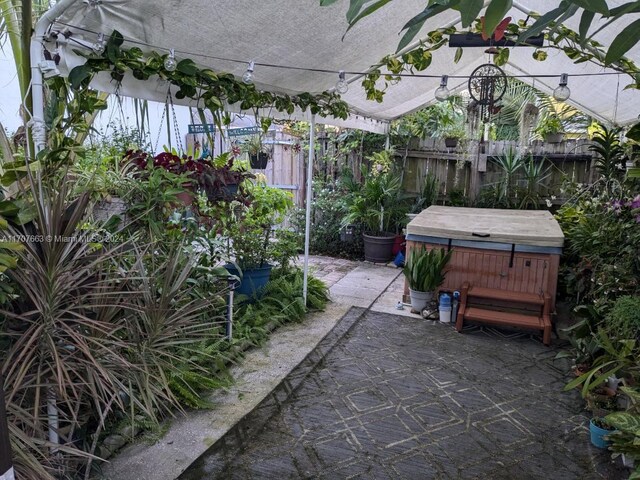 view of patio featuring a hot tub