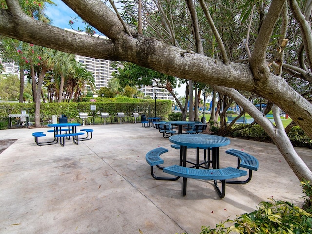 view of home's community featuring a patio area