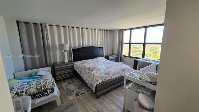 bedroom featuring light hardwood / wood-style flooring