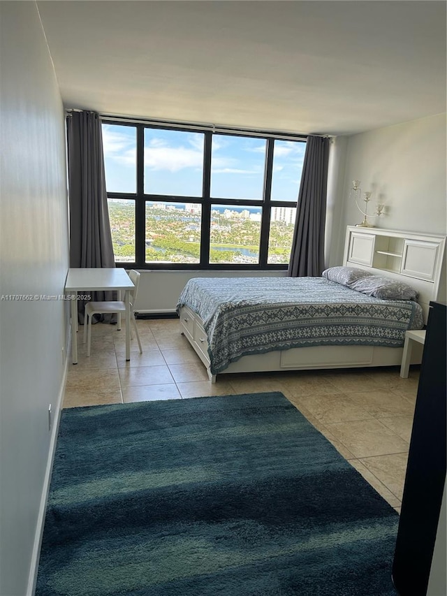 unfurnished bedroom with light tile patterned floors