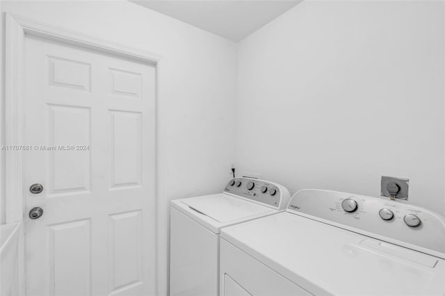 laundry room with washer and dryer