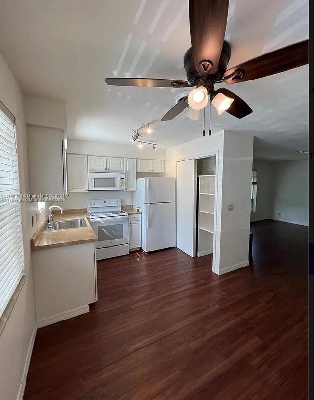 3600 Jackson St Unit 8, Hollywood, FL 33021 - kitchen with sink, white cabinets, dark hardwood / wood-style floors, and white appliances
