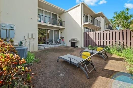 rear view of property with a patio area