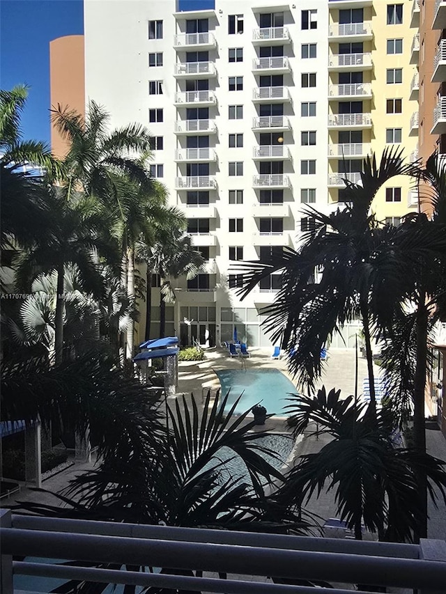 view of property with a community pool