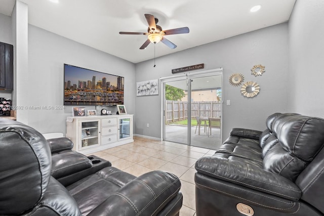 tiled living room featuring ceiling fan