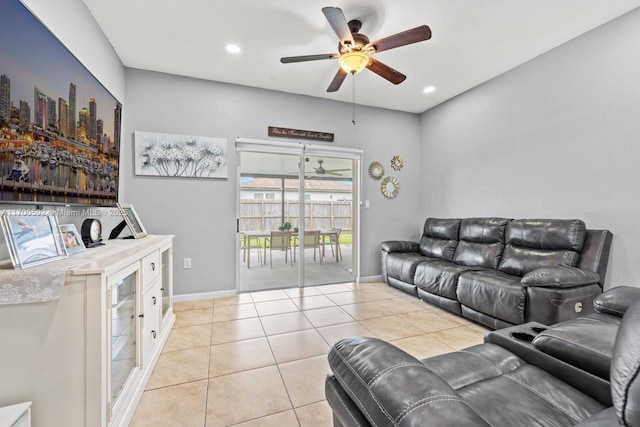 living room featuring light tile patterned floors, ceiling fan, and recessed lighting