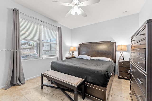 bedroom featuring light tile patterned floors and ceiling fan