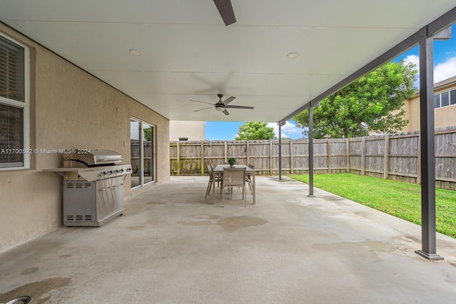 view of patio with grilling area and ceiling fan