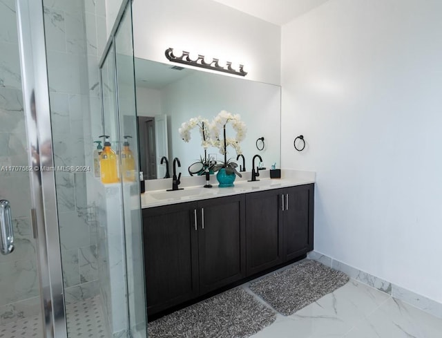 bathroom with vanity and an enclosed shower