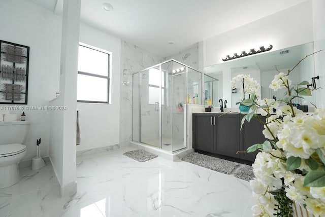 bathroom featuring walk in shower, vanity, and toilet