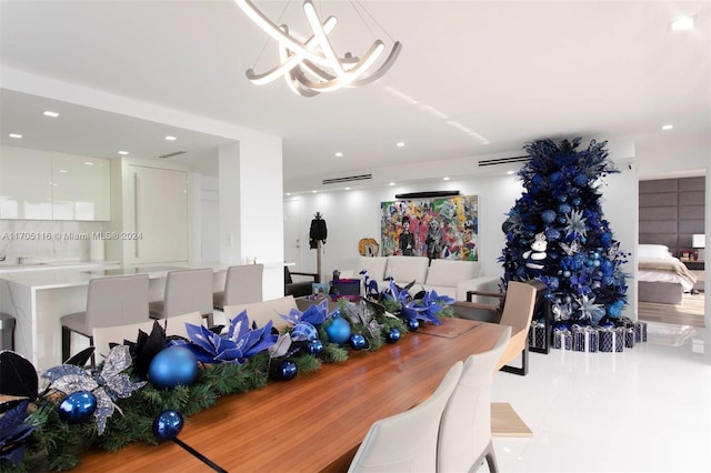 dining area featuring a chandelier