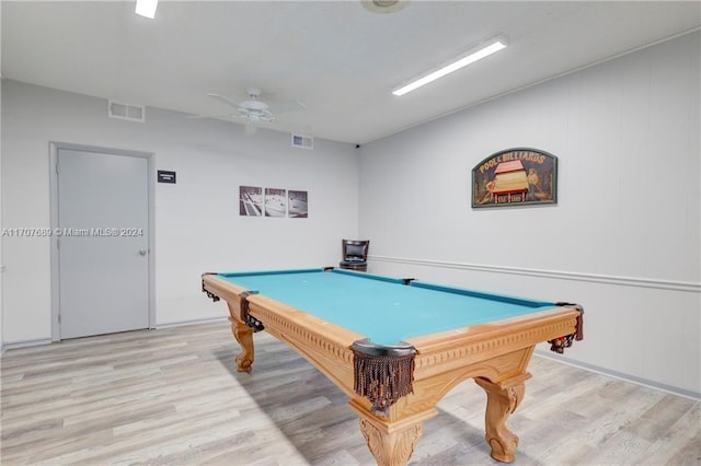 playroom featuring light hardwood / wood-style floors, ceiling fan, wood walls, and billiards