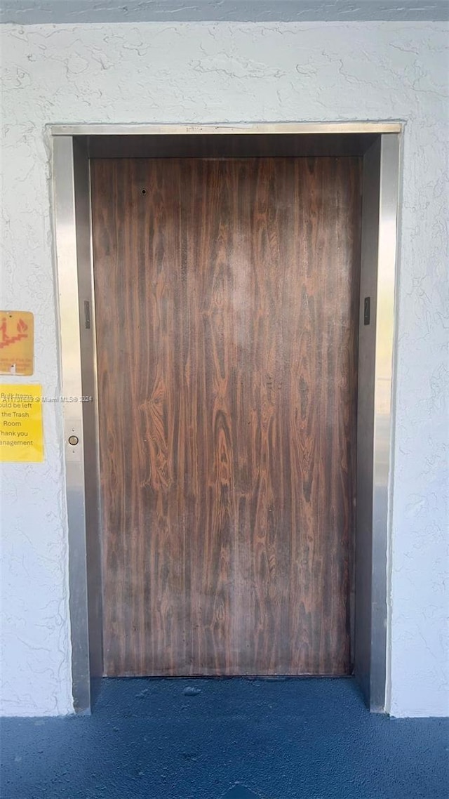 view of exterior entry with elevator