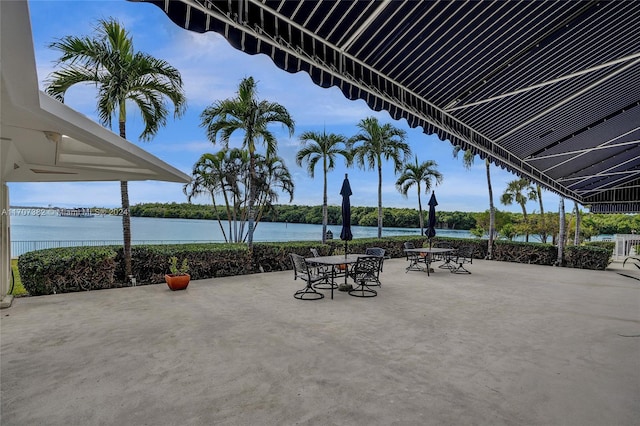 view of patio featuring a water view