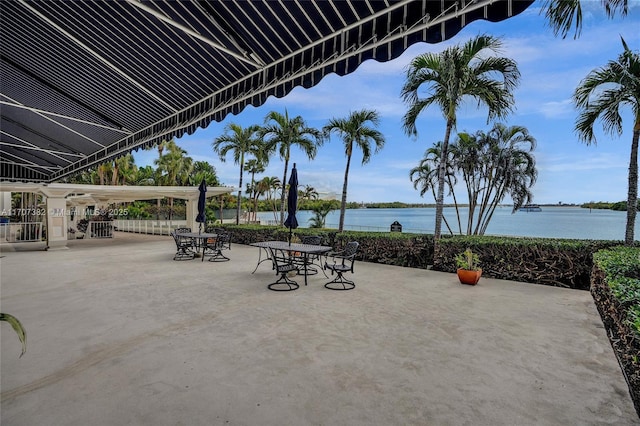 500 Bayview Dr Unit 118, Sunny Isles Beach, FL 33160 - view of patio featuring a water view and outdoor dining space