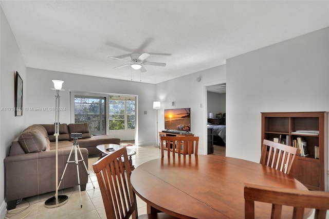 7200 NW 5th Ct Unit 206, Margate, FL 33063 - dining space featuring ceiling fan, light tile patterned flooring, and a textured ceiling