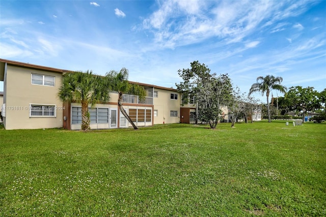 7200 NW 5th Ct Unit 206, Margate, FL 33063 - back of property featuring stucco siding and a lawn