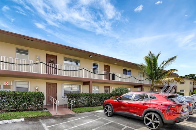 7200 NW 5th Ct Unit 206, Margate, FL 33063 - view of building exterior with uncovered parking