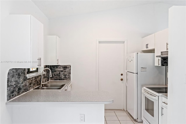 kitchen featuring sink, white cabinets, light tile patterned flooring, and white appliances