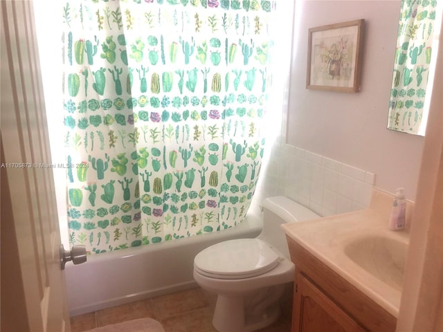 full bathroom with tile patterned floors, vanity, toilet, and tub / shower combination