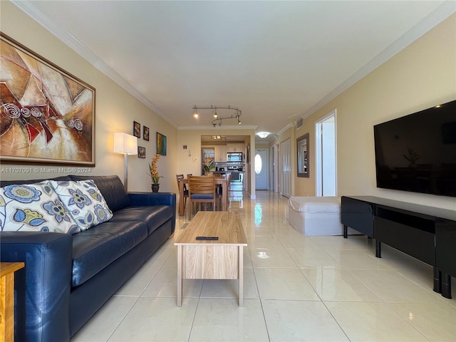 living room featuring ornamental molding and light tile patterned flooring