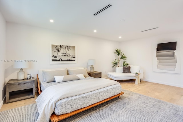 bedroom featuring light wood-type flooring