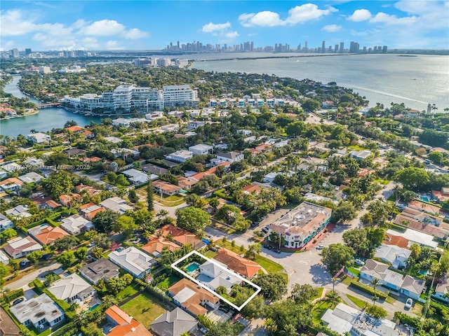 drone / aerial view with a water view