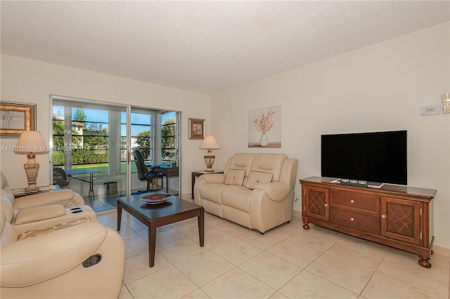 tiled living room with a textured ceiling