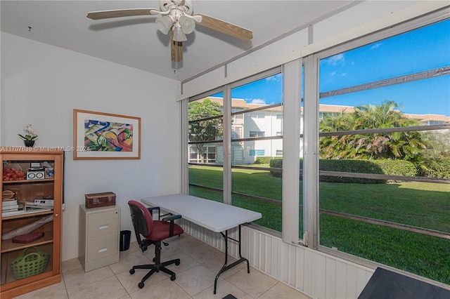 office with ceiling fan and light tile patterned floors