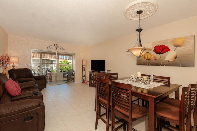 dining room featuring a textured ceiling