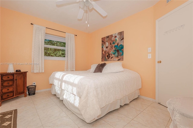 bedroom featuring ceiling fan and light tile patterned floors