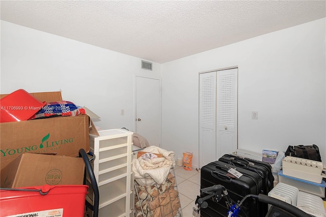 interior space featuring a textured ceiling