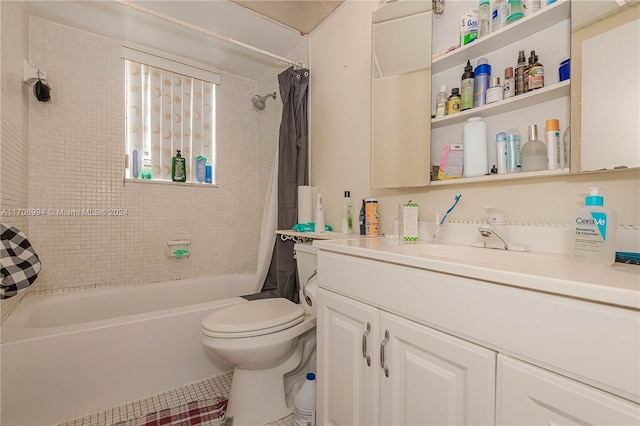 full bathroom with shower / tub combo with curtain, vanity, and toilet