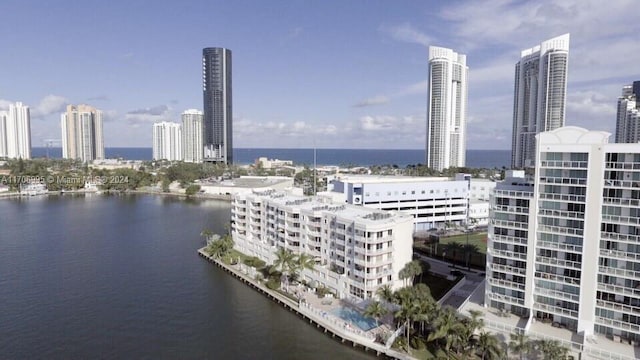 property's view of city with a water view