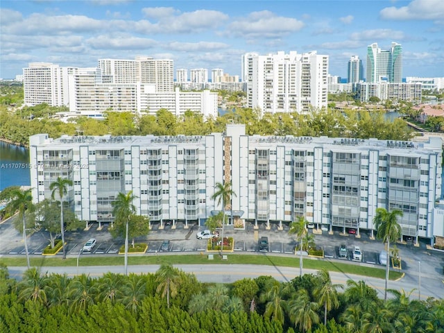 drone / aerial view with a water view and a city view