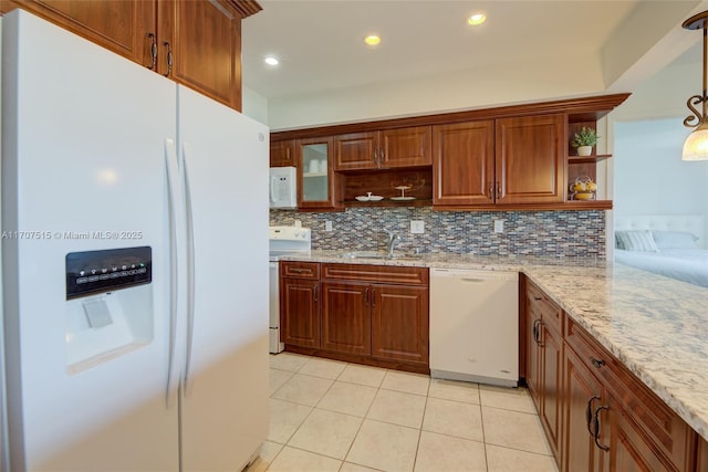 kitchen with backsplash, a sink, open shelves, and white appliances
