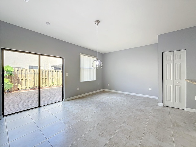 view of tiled spare room