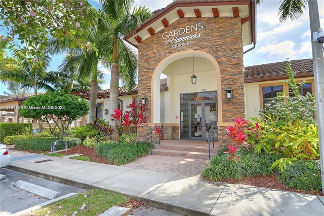 view of exterior entry with french doors