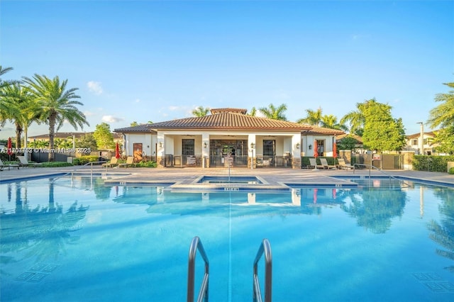 view of swimming pool featuring a patio area