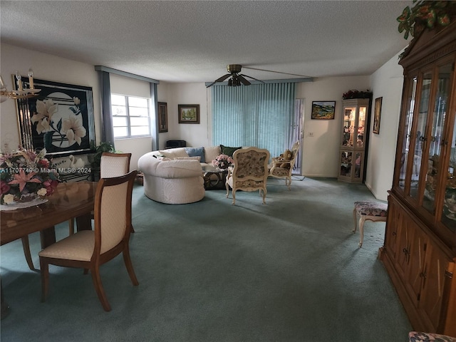 interior space featuring ceiling fan and a textured ceiling