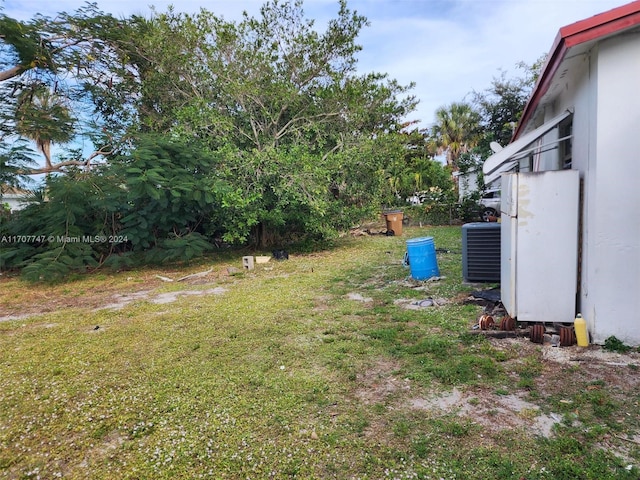 317 NW 3rd St, Deerfield Beach, FL 33441 - view of yard featuring central AC unit