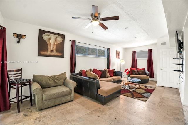 living room with ceiling fan