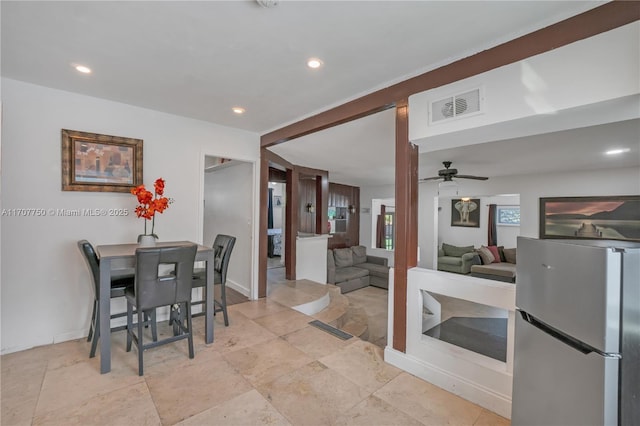 dining space featuring ceiling fan