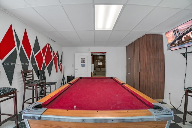 recreation room with a drop ceiling and billiards