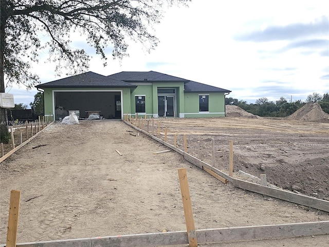 view of front of property featuring a garage