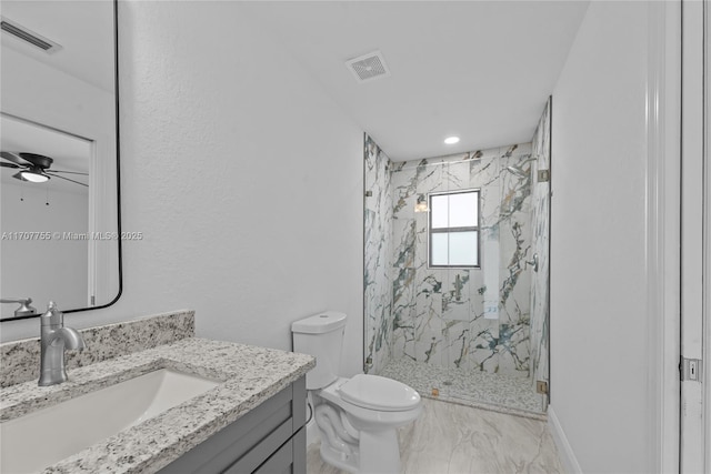 bathroom featuring ceiling fan, walk in shower, vanity, and toilet