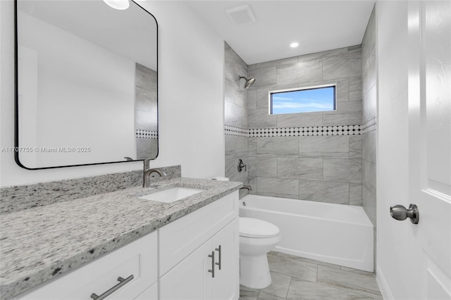 full bath with shower / tub combination, toilet, and vanity