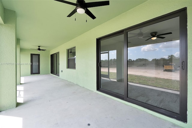 view of patio / terrace featuring ceiling fan