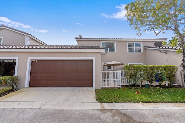 view of front of home featuring a garage