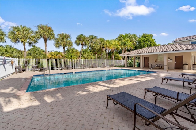 view of pool featuring a patio